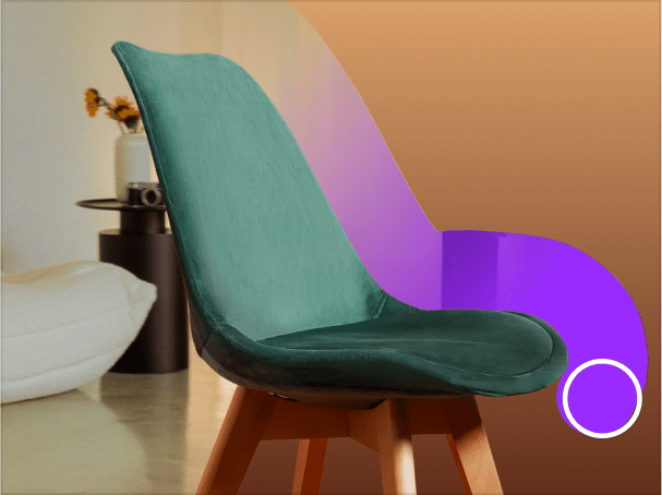 Photo of a green velvet chair in a modern room with a curved purple design accent.